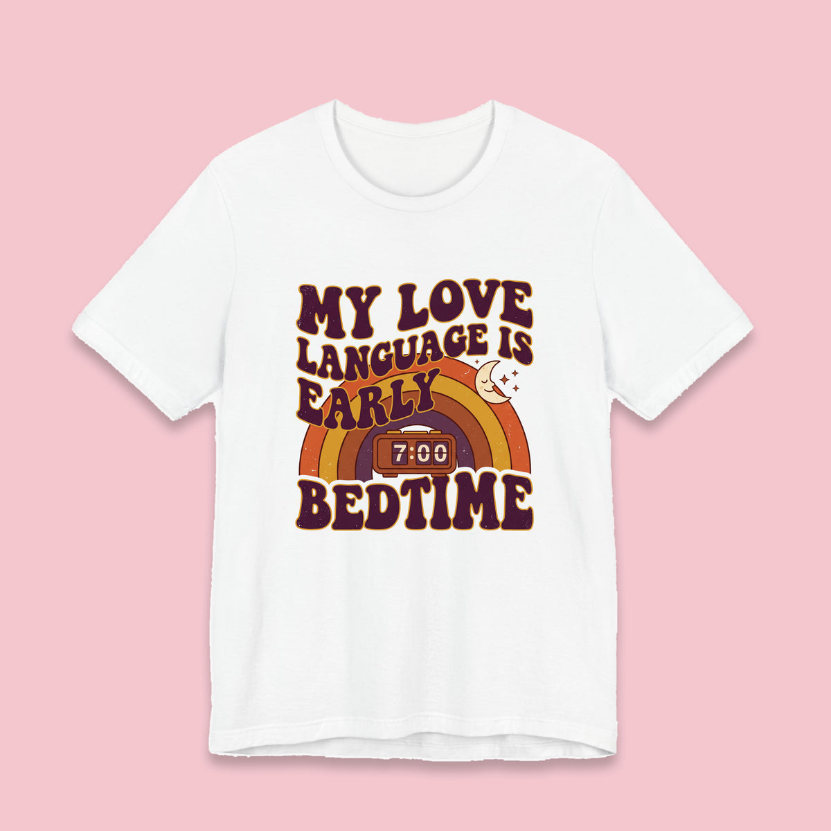 My Love Language Is Early Bedtime adult tee – Flat on pink background