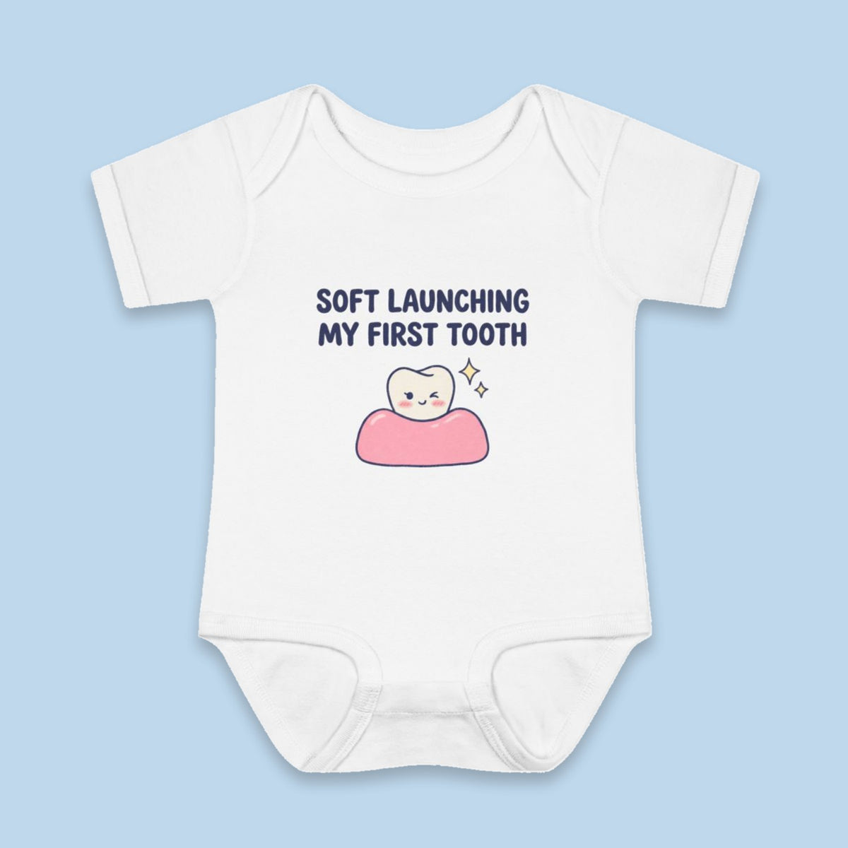 Soft Launching My First Tooth onesie – Flat on blue background