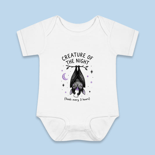Creature of the Night (Feeds Every 3 Hours) onesie – Flat on blue background