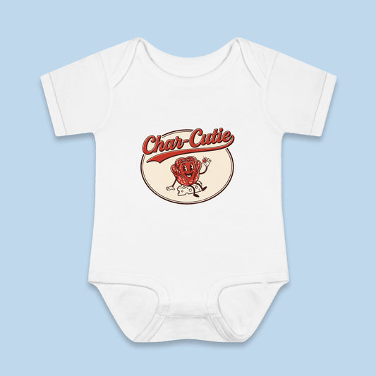 Char-Cutie onesie – Flat on blue background