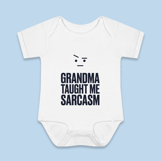 Grandma Taught Me Sarcasm onesie – Flat on blue background