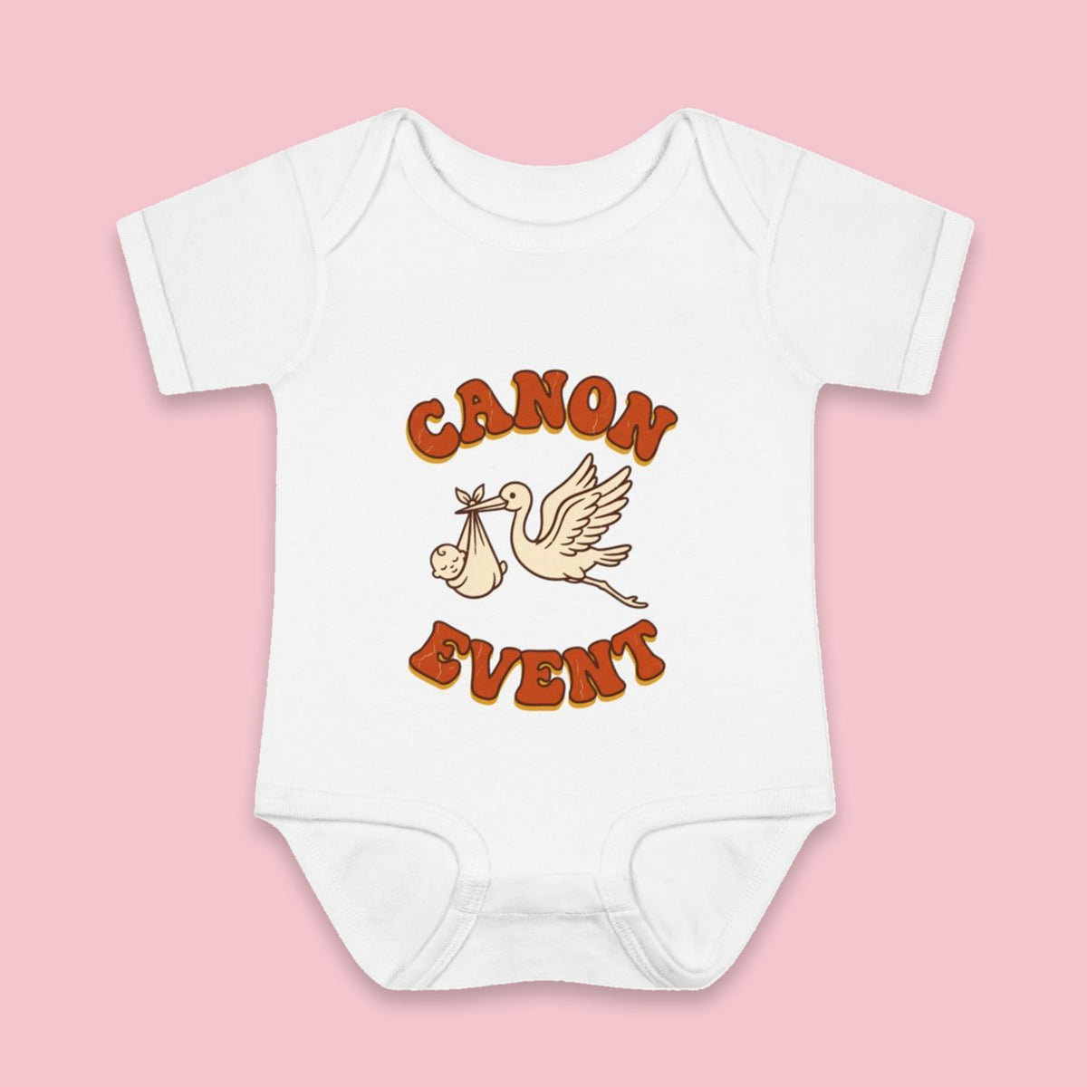 Canon Event onesie – Flat on pink background