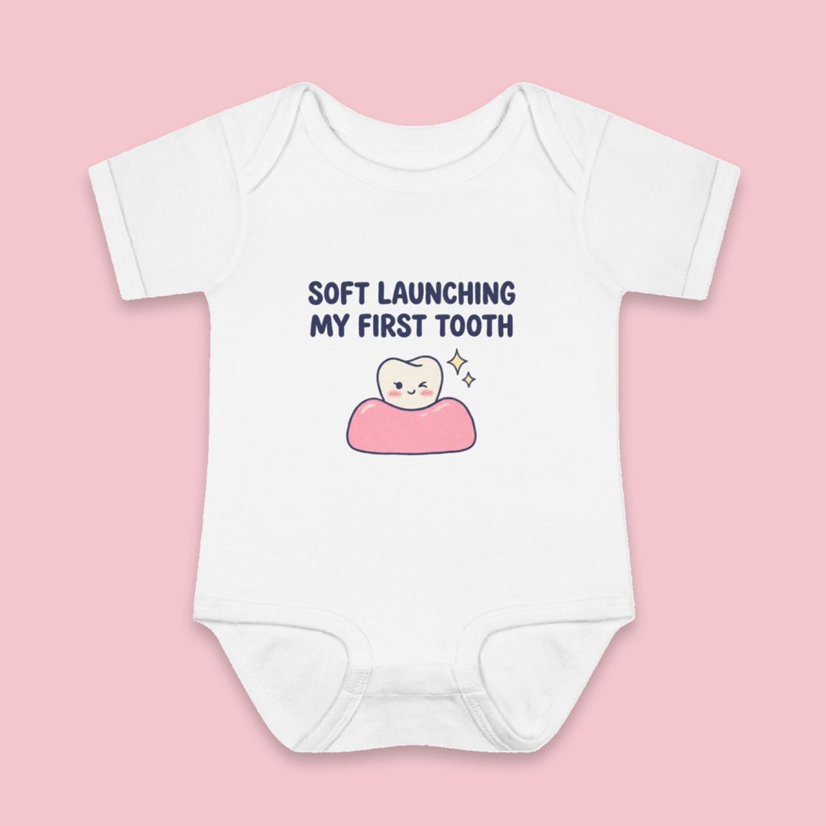 Soft Launching My First Tooth onesie – Flat on pink background