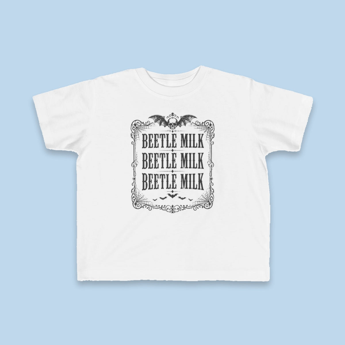 Beetle Milk toddler tee – Flat on blue background