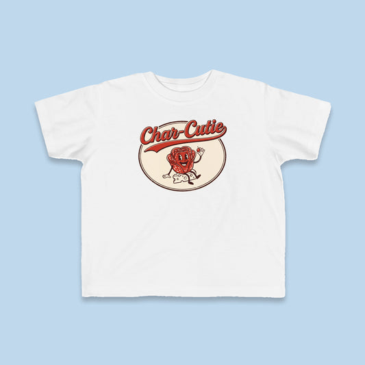 Char-Cutie toddler tee – Flat on blue background