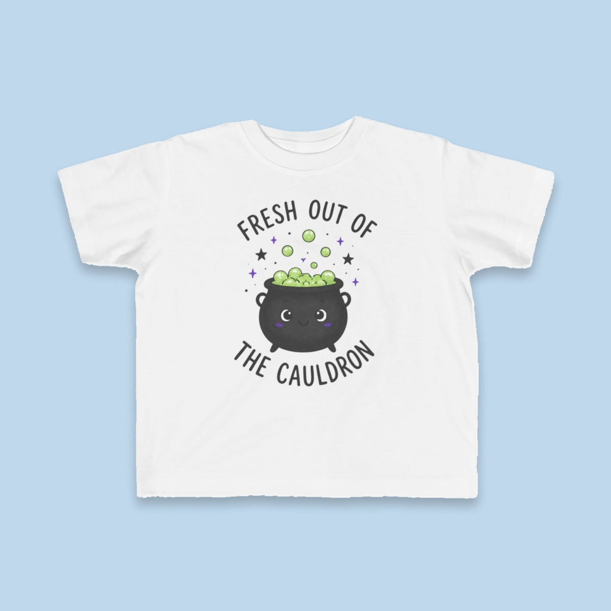 Fresh Out of the Cauldron toddler tee – Flat on blue background