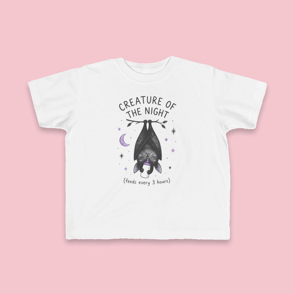 Creature of the Night (Feeds Every 3 Hours) toddler tee – Flat on pink background