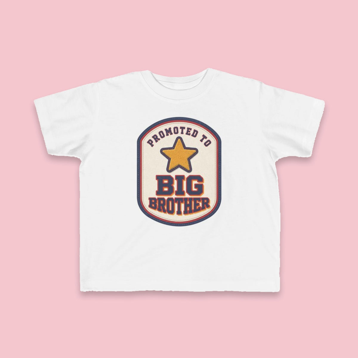 Promoted to Big Brother toddler tee – Flat on pink background