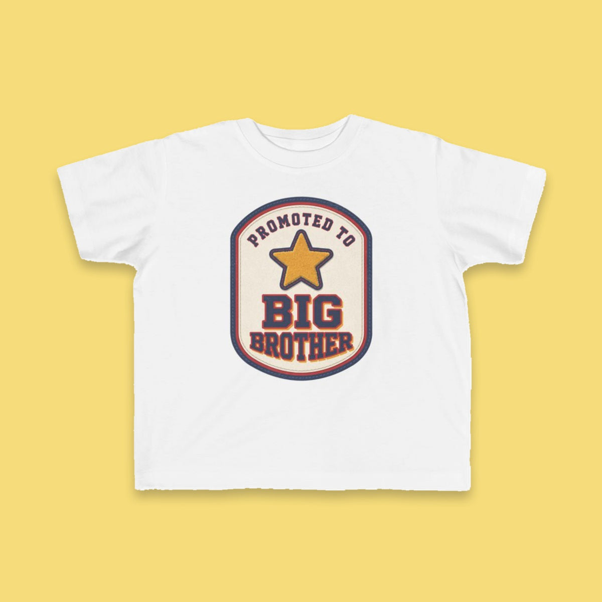 Promoted to Big Brother toddler tee – Flat on yellow background