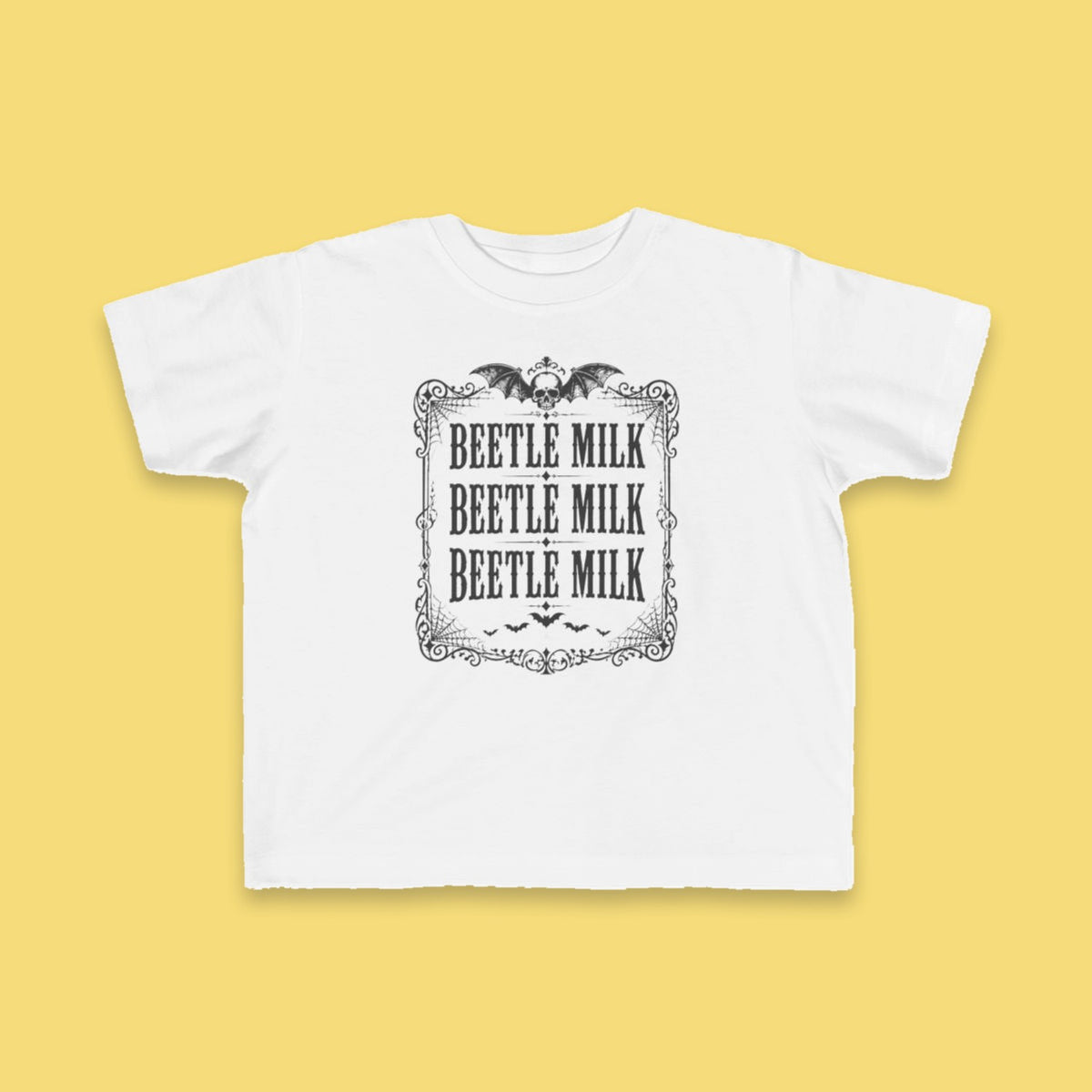 Beetle Milk toddler tee – Flat on yellow background
